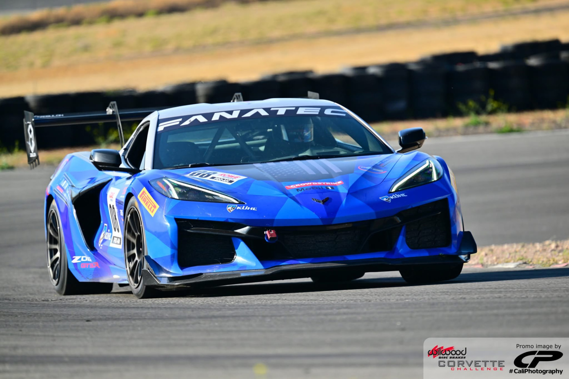 Blue C8 Corvette Z06 GT3.R at speed on track