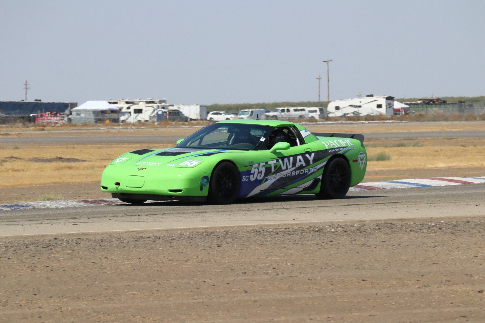 Green #55 C5 Corvette on a desert circuit
