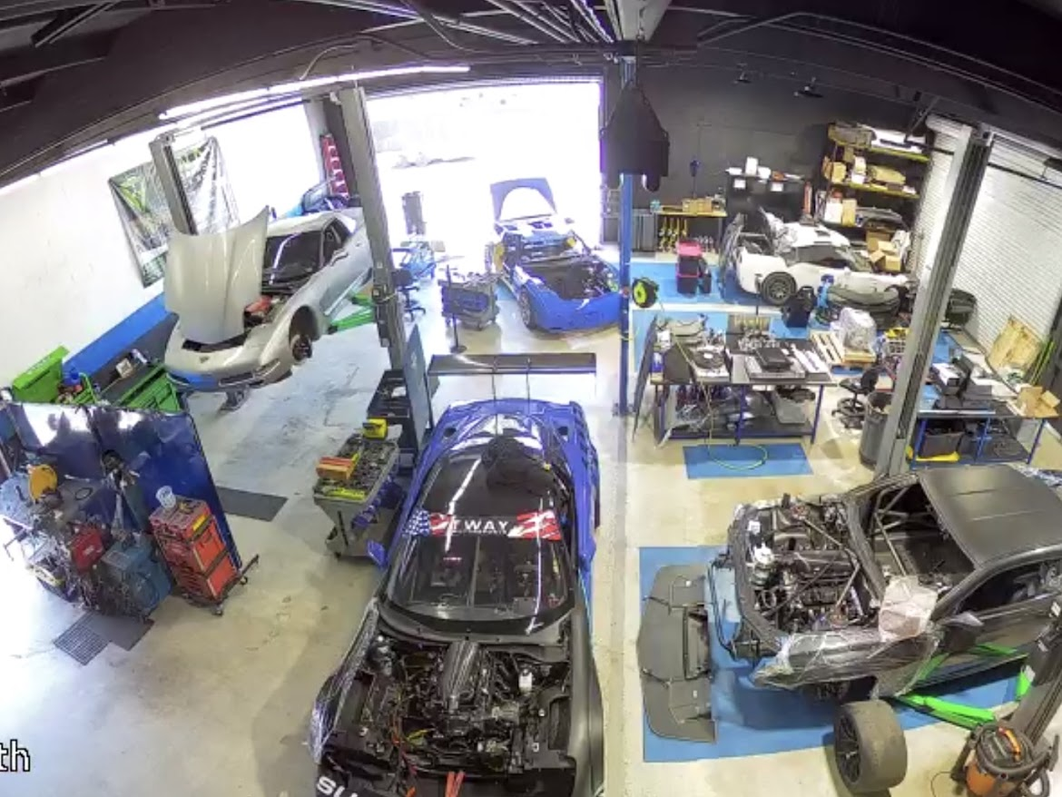 Wide overhead view of the Tway Motorsports shop floor