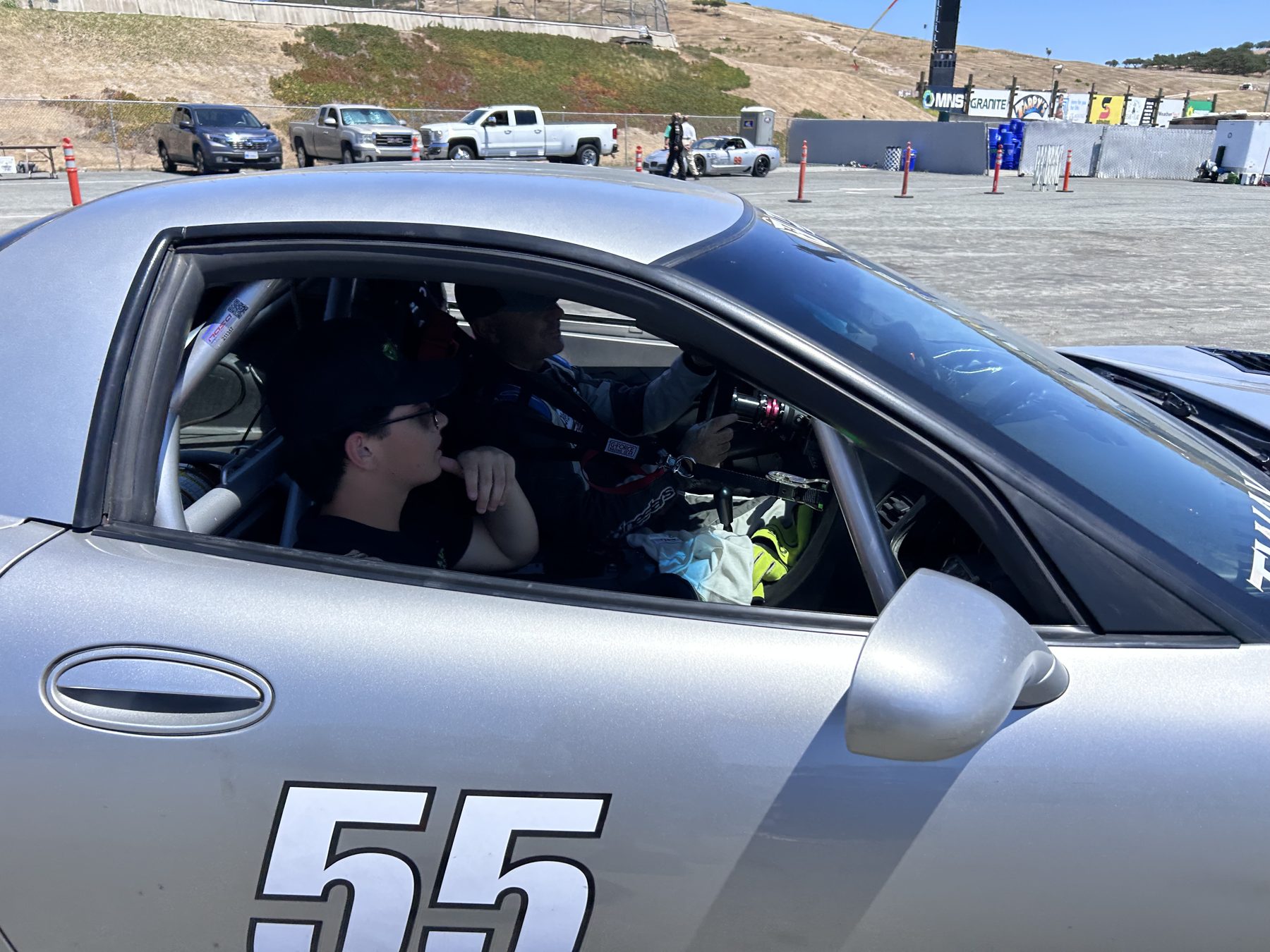 Silver #55 C5 Corvette Z06 parked in the paddock