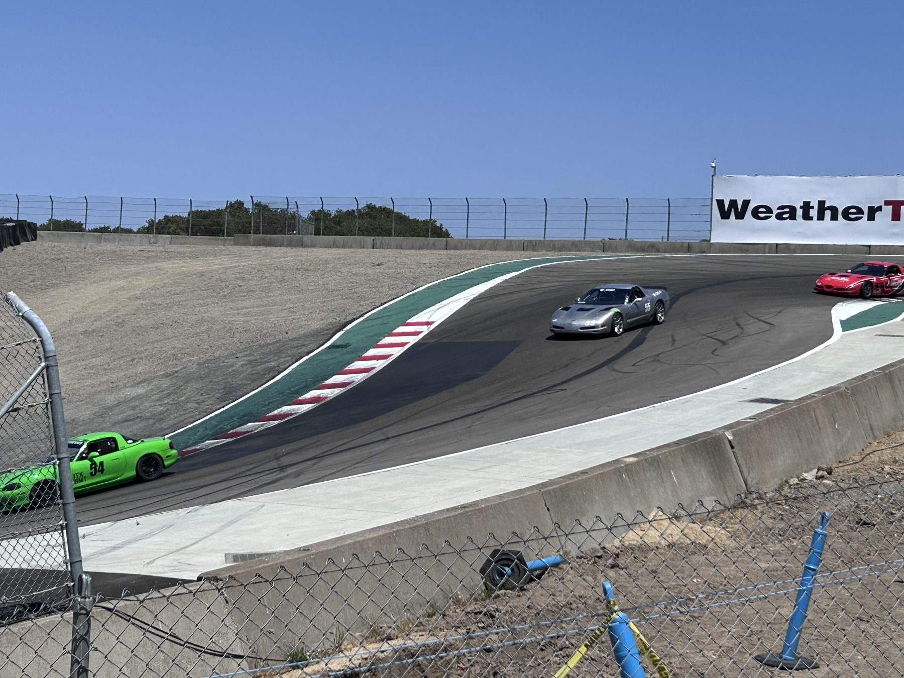 Silver #55 C5 Corvette Z06 at the track