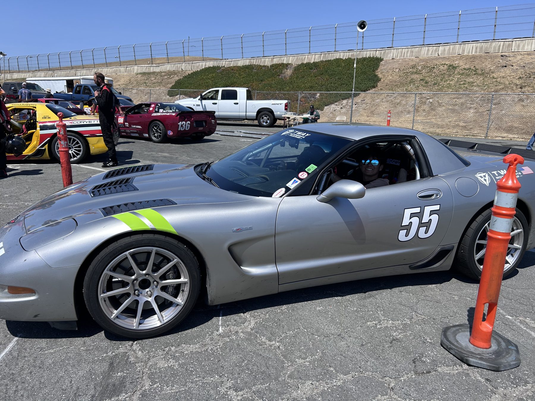 Silver #55 C5 Corvette Z06 during a track session